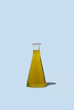 Olive oil and blue background 