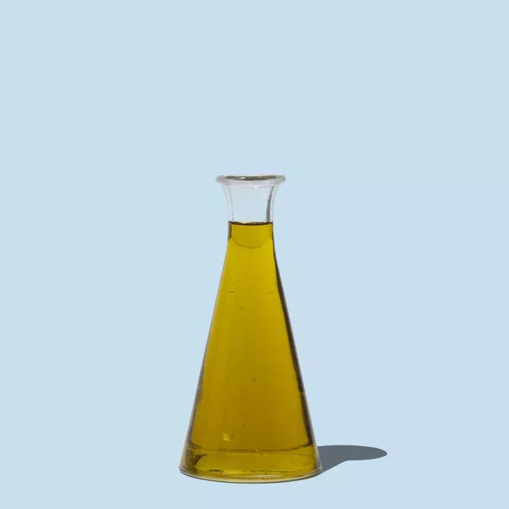 Olive oil and blue background 