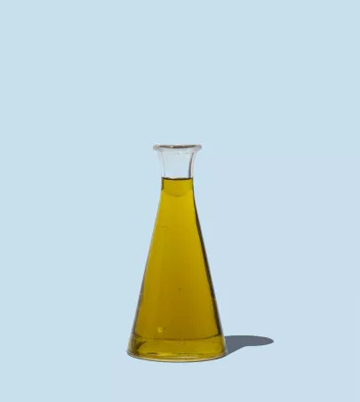 Olive oil and blue background 