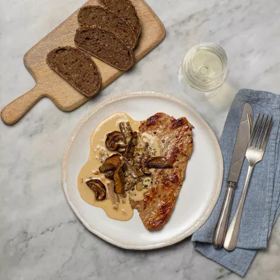 Veal scallops with creamy porcini mushroom sauce